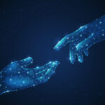 Alcance two hands pointing one each other